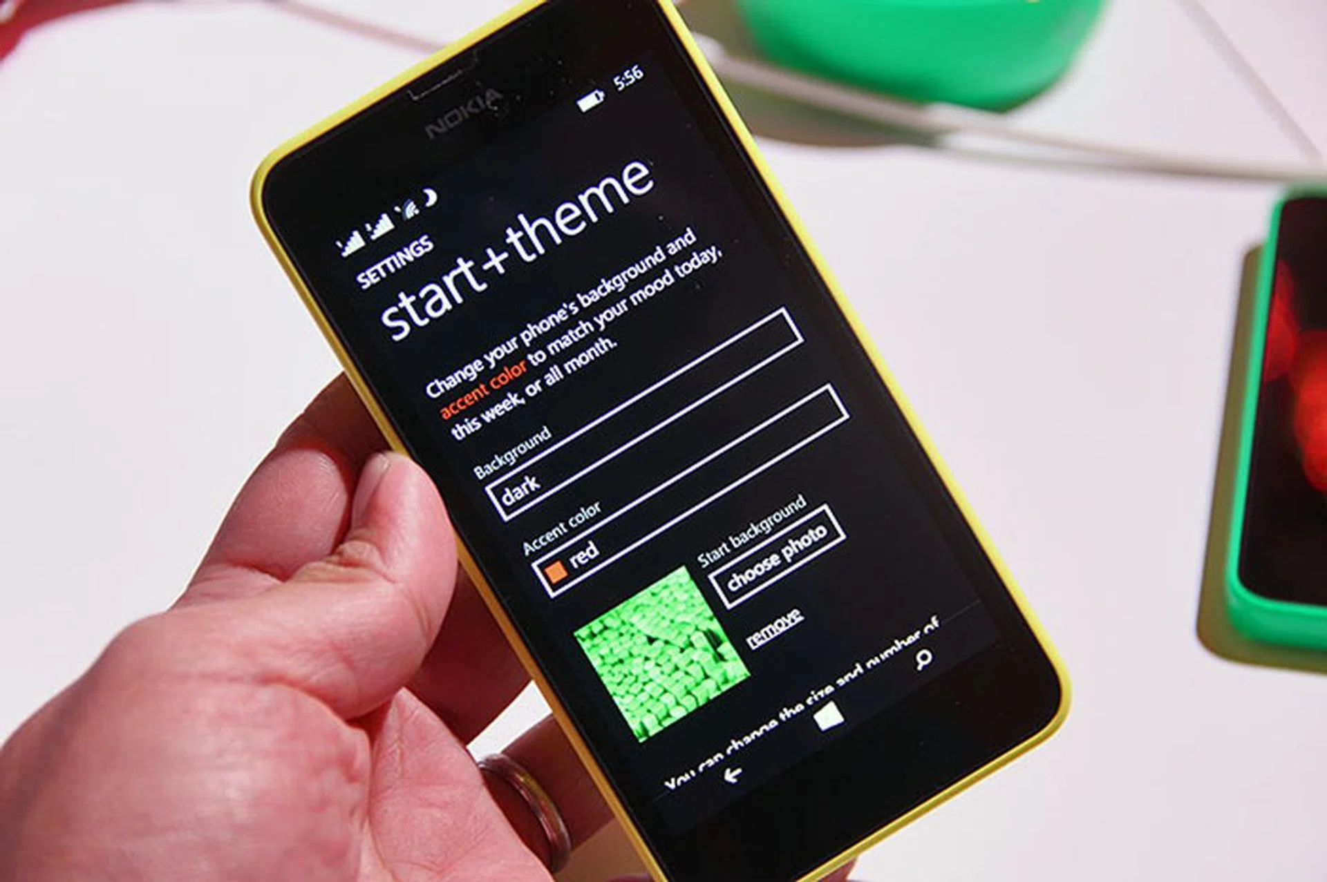 In addition to choosing a background color and an accent color, you can now choose a photo for the Start background.