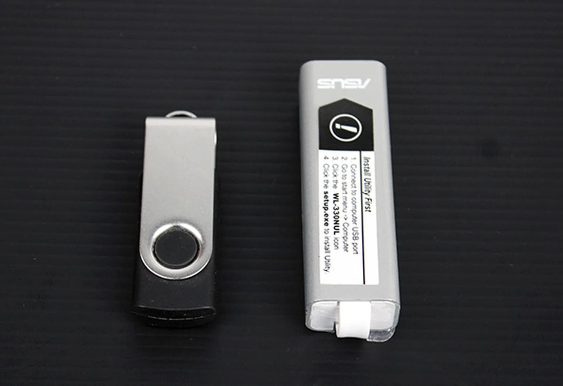 The ASUS WL-330NUL Pocket Router is slightly larger than your typical USB flash drive.
