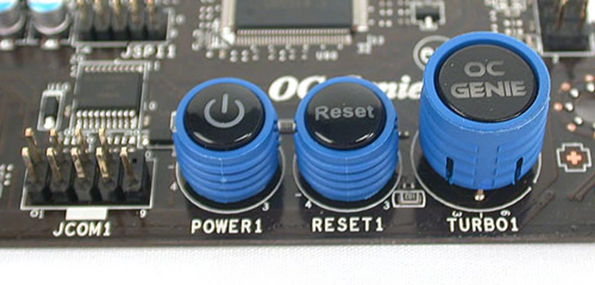 The onboard power and rest buttons along with MSI's one-button OC Genie auto-overclocking functionality.