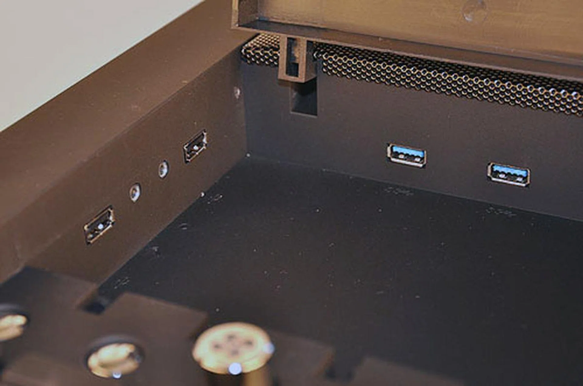 BitFenix has also located the front ports around this compartment. The two USB ports in blue are USB 3.0 compatible, suited for those early adopters who have switched to newer USB 3.0 capable motherboards. There's also an eSATA port (not shown in this image) and the usual audio jacks.