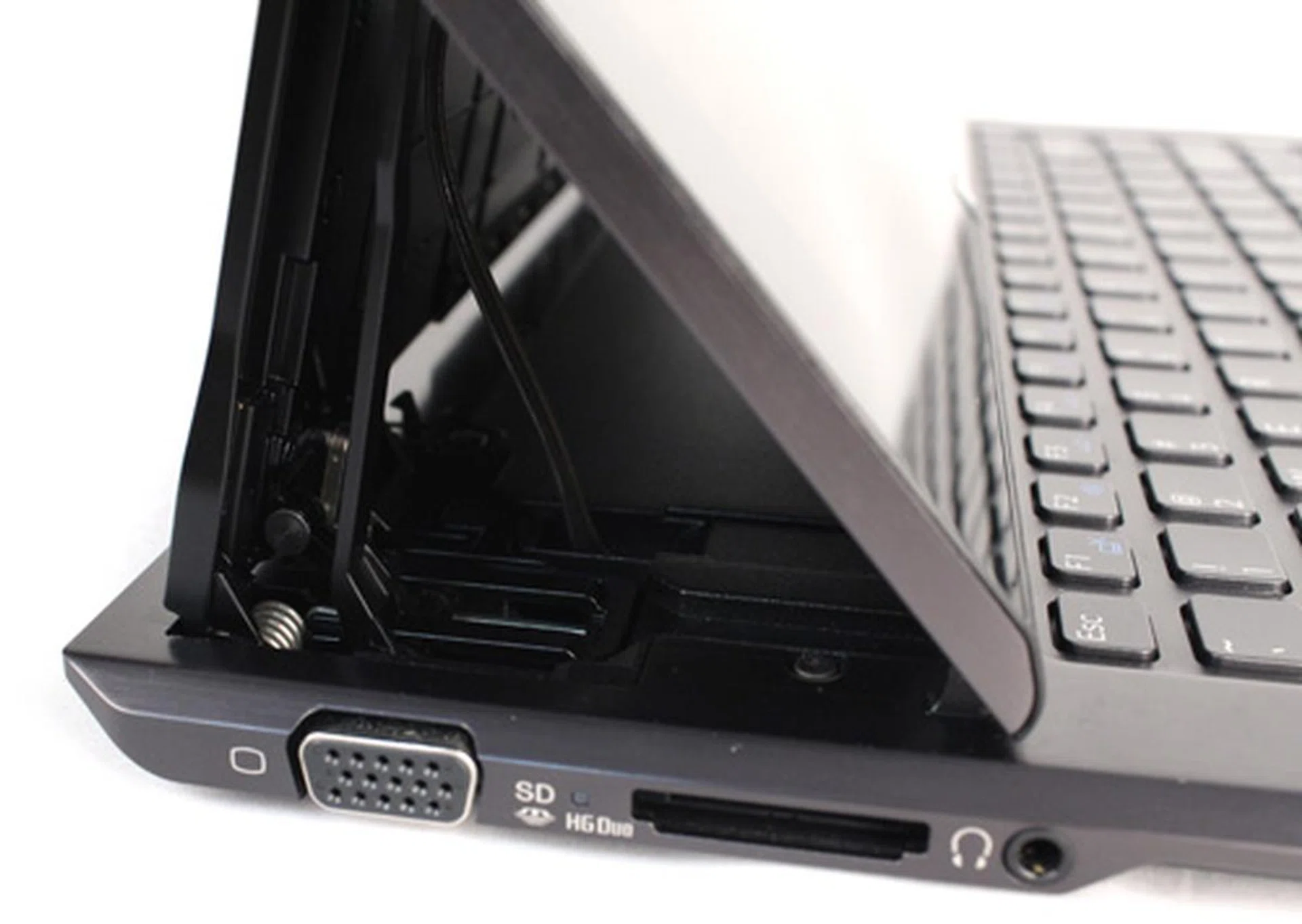 A closer inspection of the 'Surf Slider' mechanism reveals a spring loaded hinge that lifts the screen up into the vertical position.