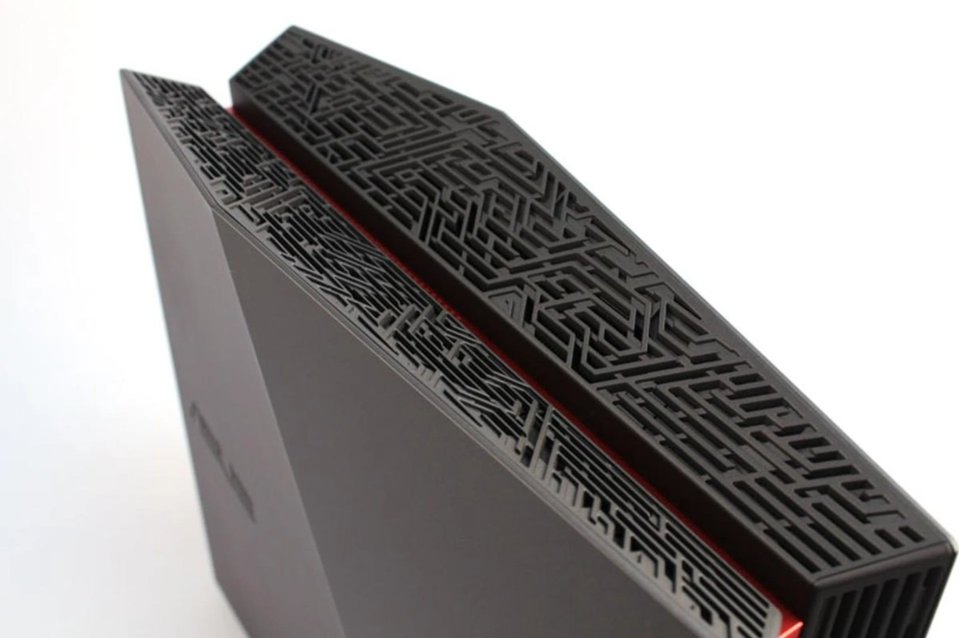 The top of the chassis features a Mayan-inspired mesh design.