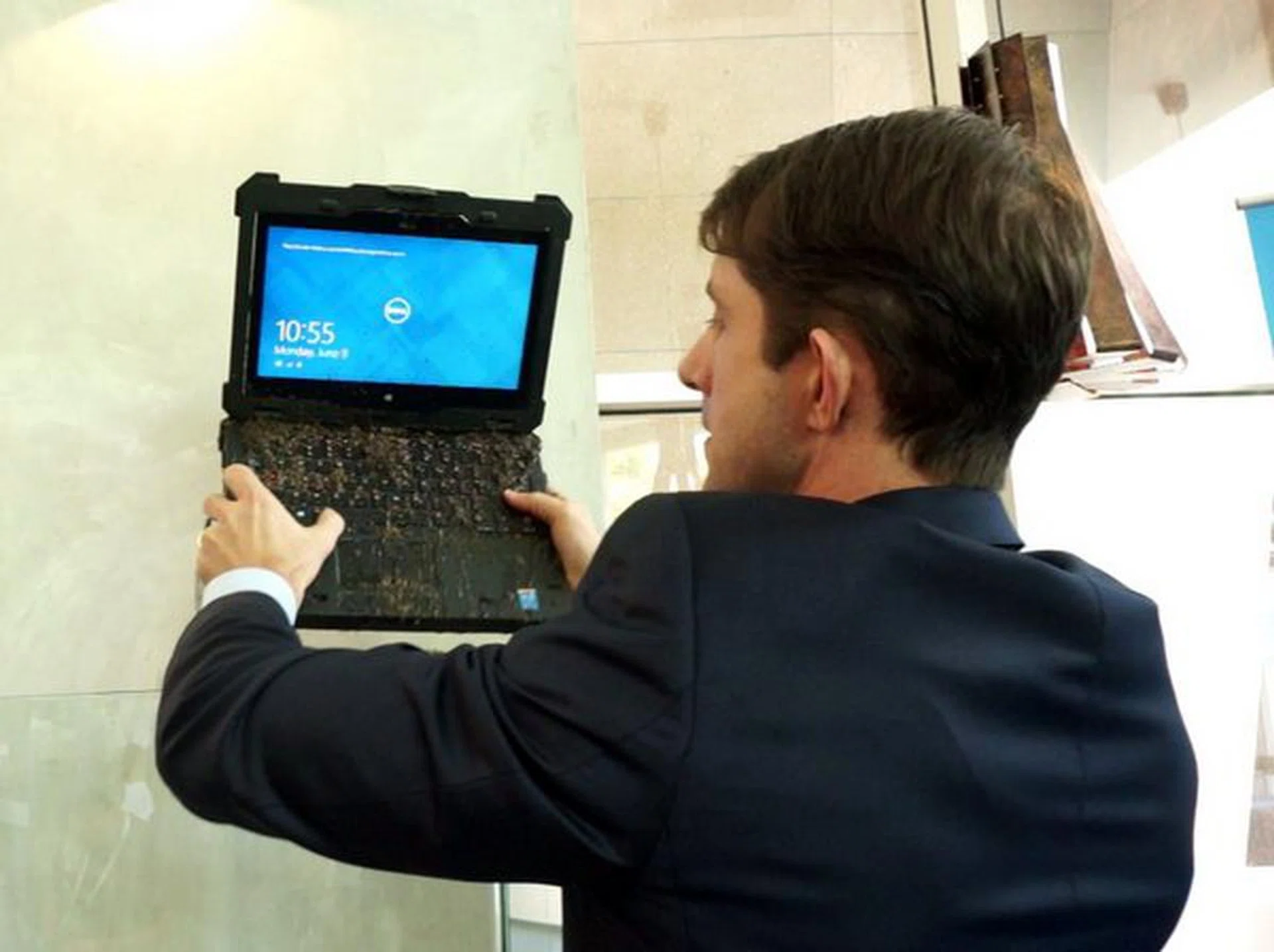 The keyboard and the screen were still responsive despite having sand and water poured all over.