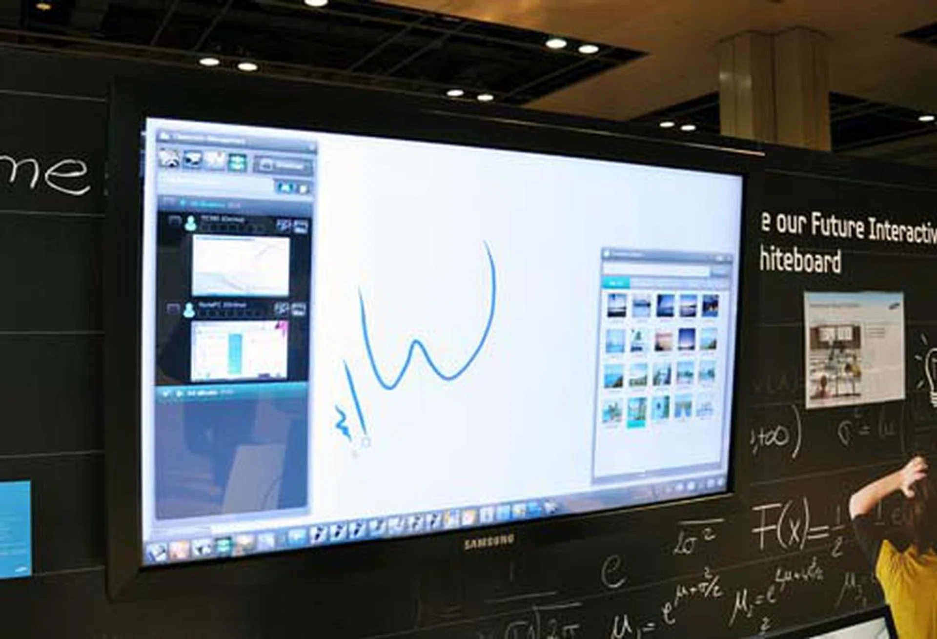Spotted here is Samsung's 65-inch optical based touchscreen interactive whiteboard. It was mentioned during the presentation that it will sync with the e-book readers for an interactive classroom environment.