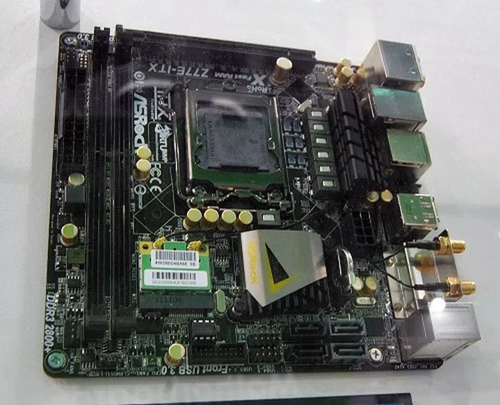 The ASRock Z77E-ITX, a mini-ITX board that supports up to 16GB of DDR3 2800+(OC) memory modules with its two DIMM slots. It has a PCIe Gen 3.0 x16 slot to take a discrete graphics card. It even features ASRock Digi Power that delivers digital pulse-width modulation to the CPU.