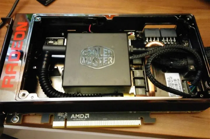 The Fury X card and its "updated" water pump. (Image source: PC Perspective)