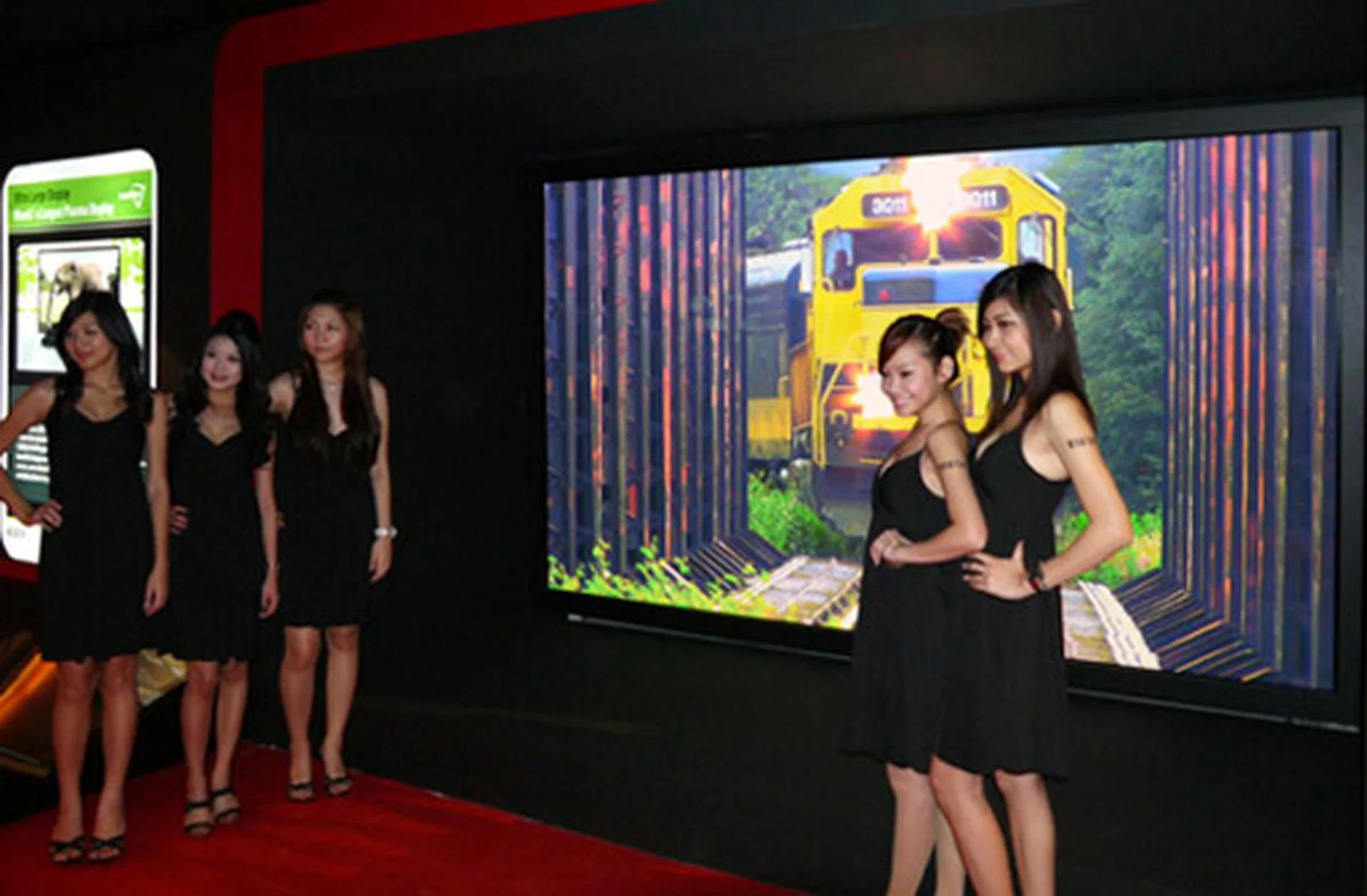 Purchase one these giants and get these babes for free! Ok, we're only kidding. With four times the resolution of Full-HD displays and measuring just about the size of nine 50-inch PDPs, you can only imagine how much the 150-inch PDP would cost you. Who needs a cinema when you have this?