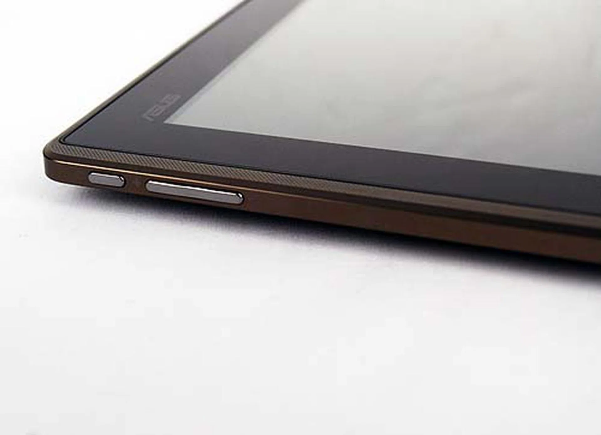 The only physical buttons that you will find on the Eee Pad. Located on the other side are the headphone jacks, the mini HDMI port and a microSD card slot.