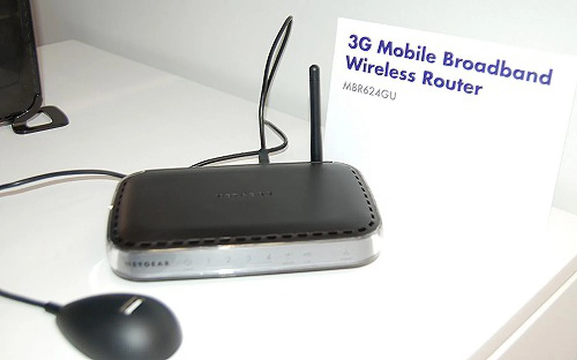  This is one of Netgear's newest products, a 3G mobile broadband router (MBR624GU). Just plug in a compatible 3G USB modem to it and you can create an instant WiFi hotspot anywhere. Also usable in your car with a universal car power adapter.  