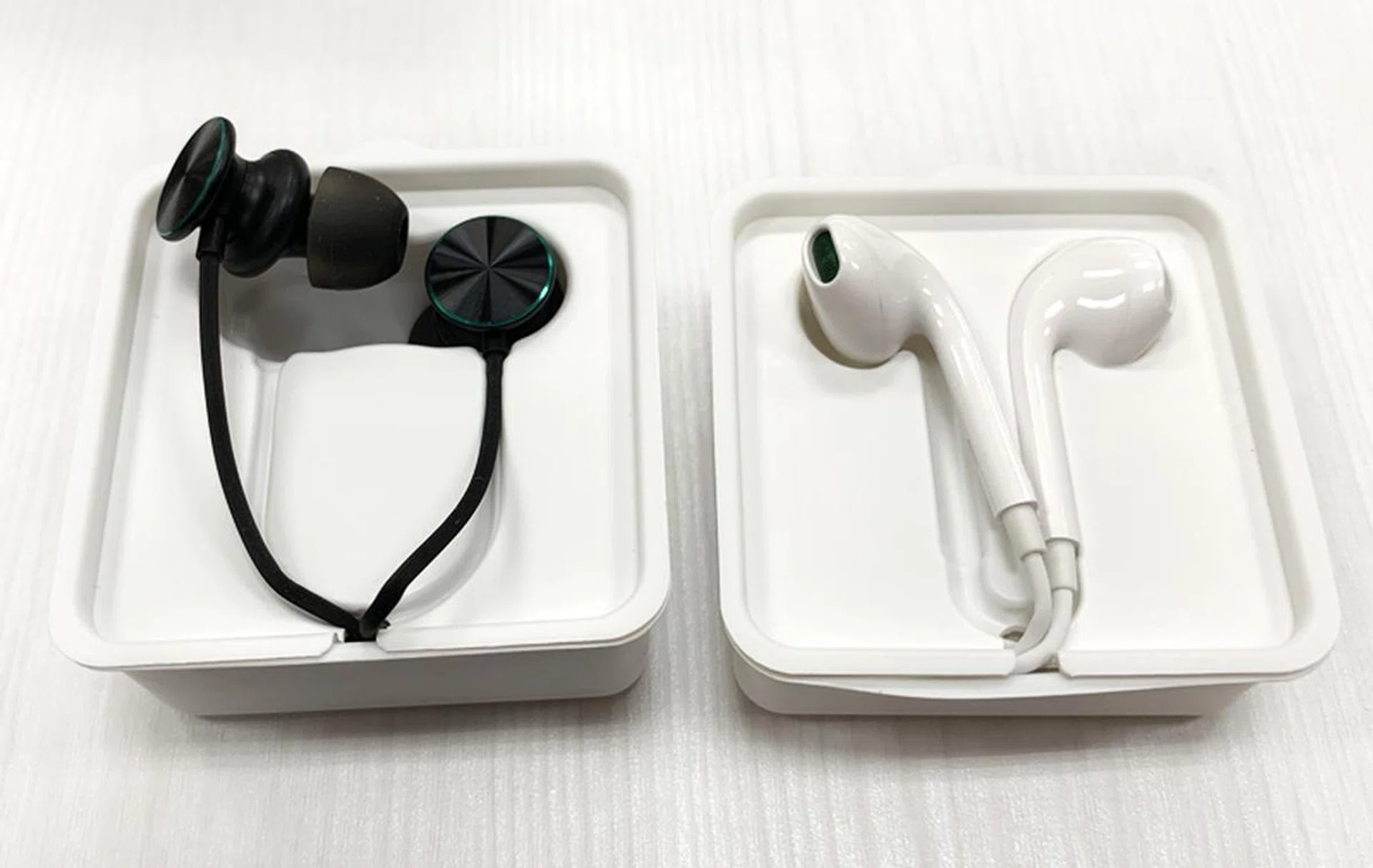 The included earbuds you get from the Reno 10X Zoom (on the left) are much better than what you get with the Reno.