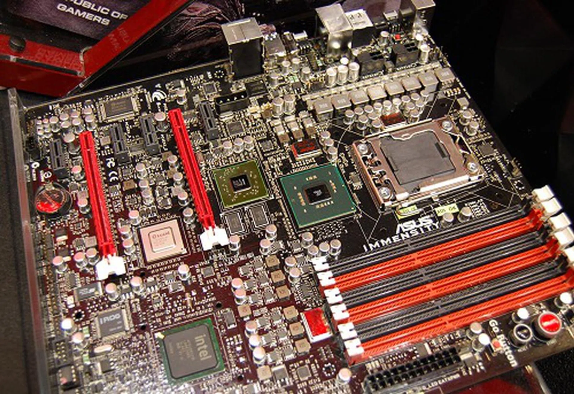 Here's the same board stripped of its heatsinks to see all those extra ICs and controllers.