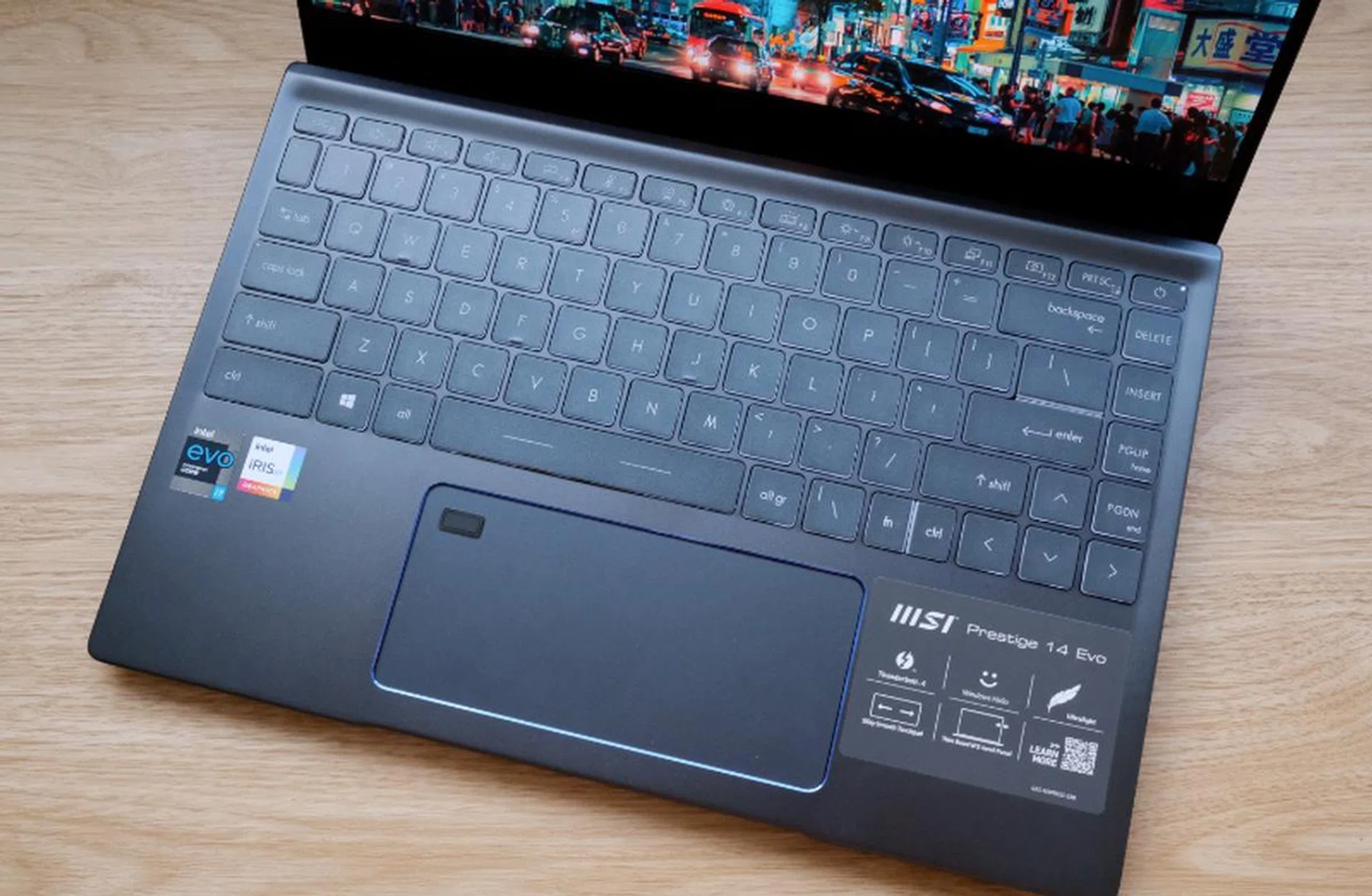 The keyboard has an additional column with navigational keys. You'll also notice the trackpad is very wide.