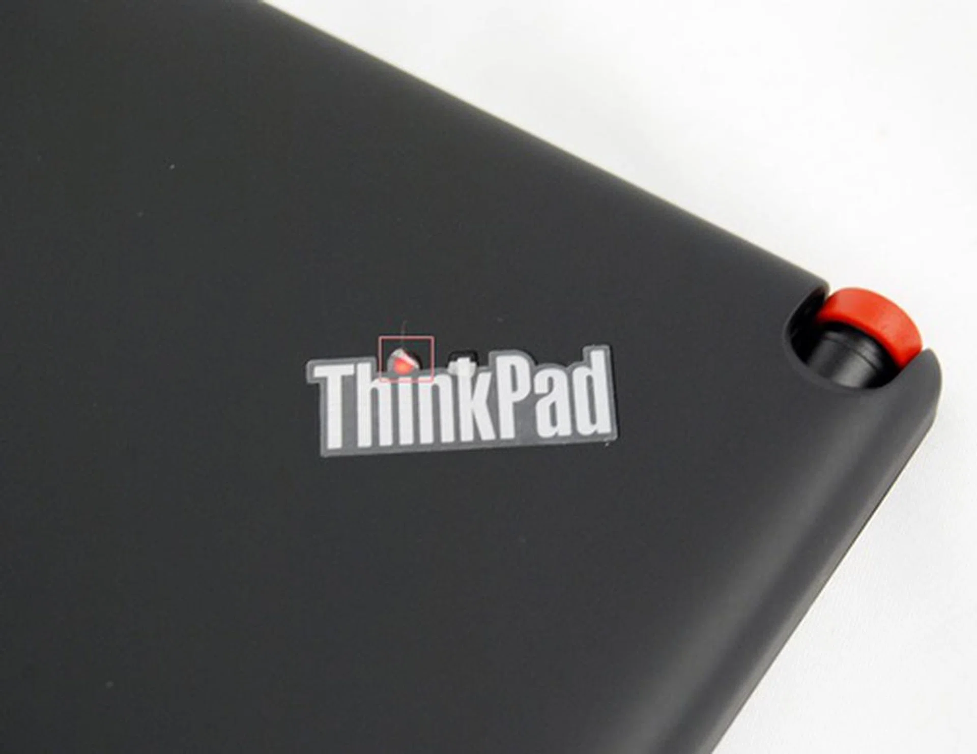 While it may be a cool feature to have a glowing red "i" in the ThinkPad logo when the tablet is powered on, it might unnecessarily drain the battery. On the right is the slot to house the ThinkPad Tablet Pen.