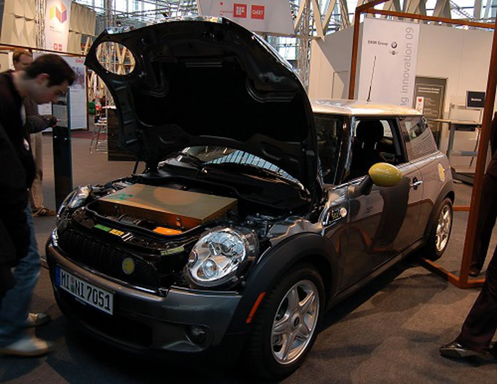 This is the Mini E - a fully electric vehicle whose electric propulsion and battery technology comes from AC Propulsion. Using AC Propulsion's tzero technology, it provides high performance, high efficiency and fast charging. In fact the 'engine' in the Mini E can generate 150kW of power or 204 horse-power, accelerate from 0 to 100KM/h in just 8.5 seconds, and manages a top speed of 152KM/h.  