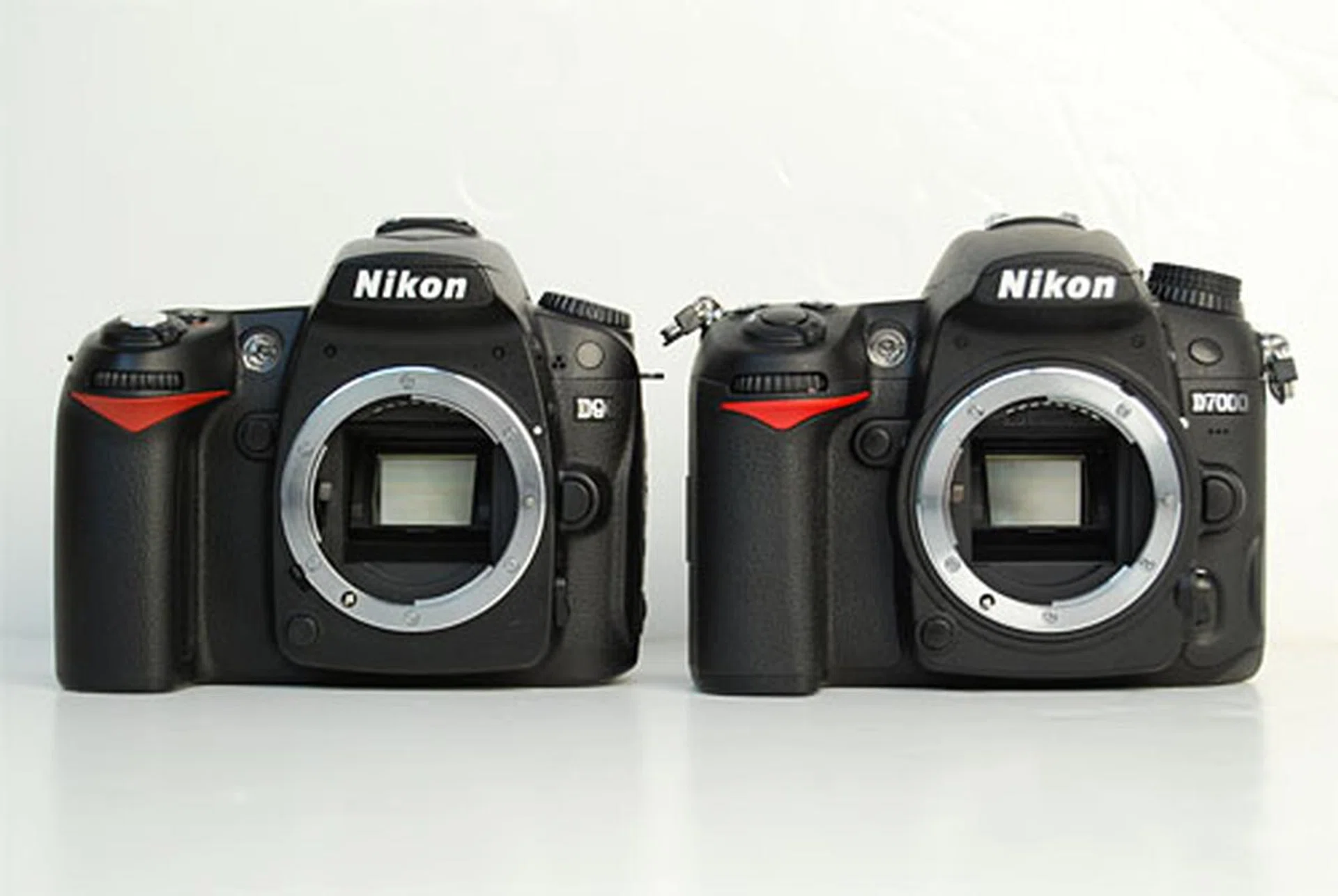 The Nikon D90 and the D7000 side by side. Notice how similar they look from the front?