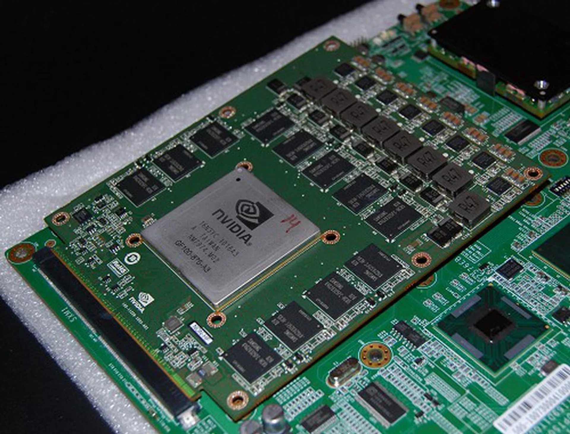Here's a Tesla module made for compact blade systems. This particular Tesla model is an X2070 with 6GB GDDR5, 448 CUDA cores and has a peak performance of 515GFLOPS.