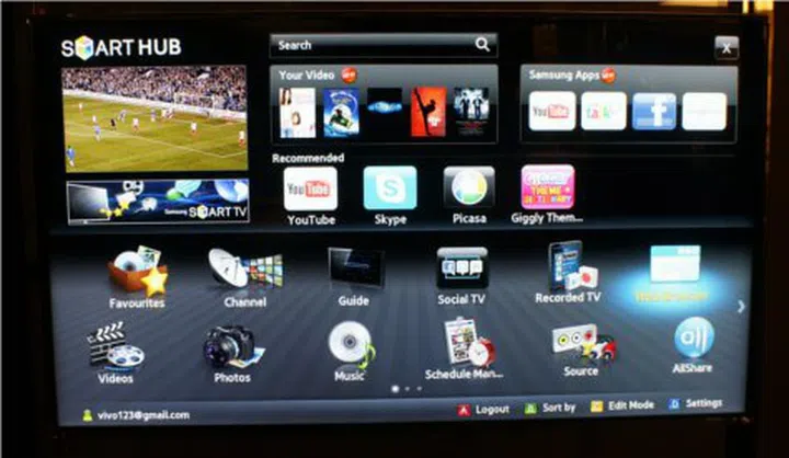 A screenshot of the Samsung Smart Hub showcasing content from Star Hub (top right), the Search All function (top center) and a whole variety of social media applications. 