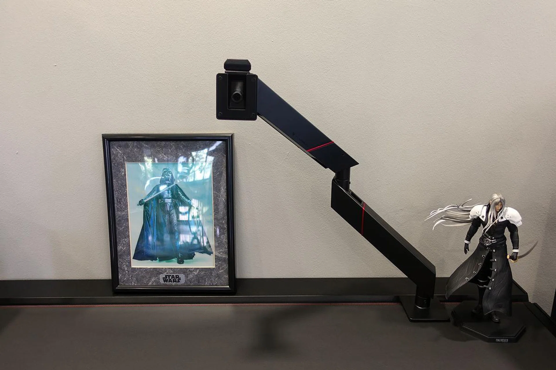 One benefit of having to fix the mount within the offset gap is that it allows you to make any positional adjustments without having to move the desk away from the wall.