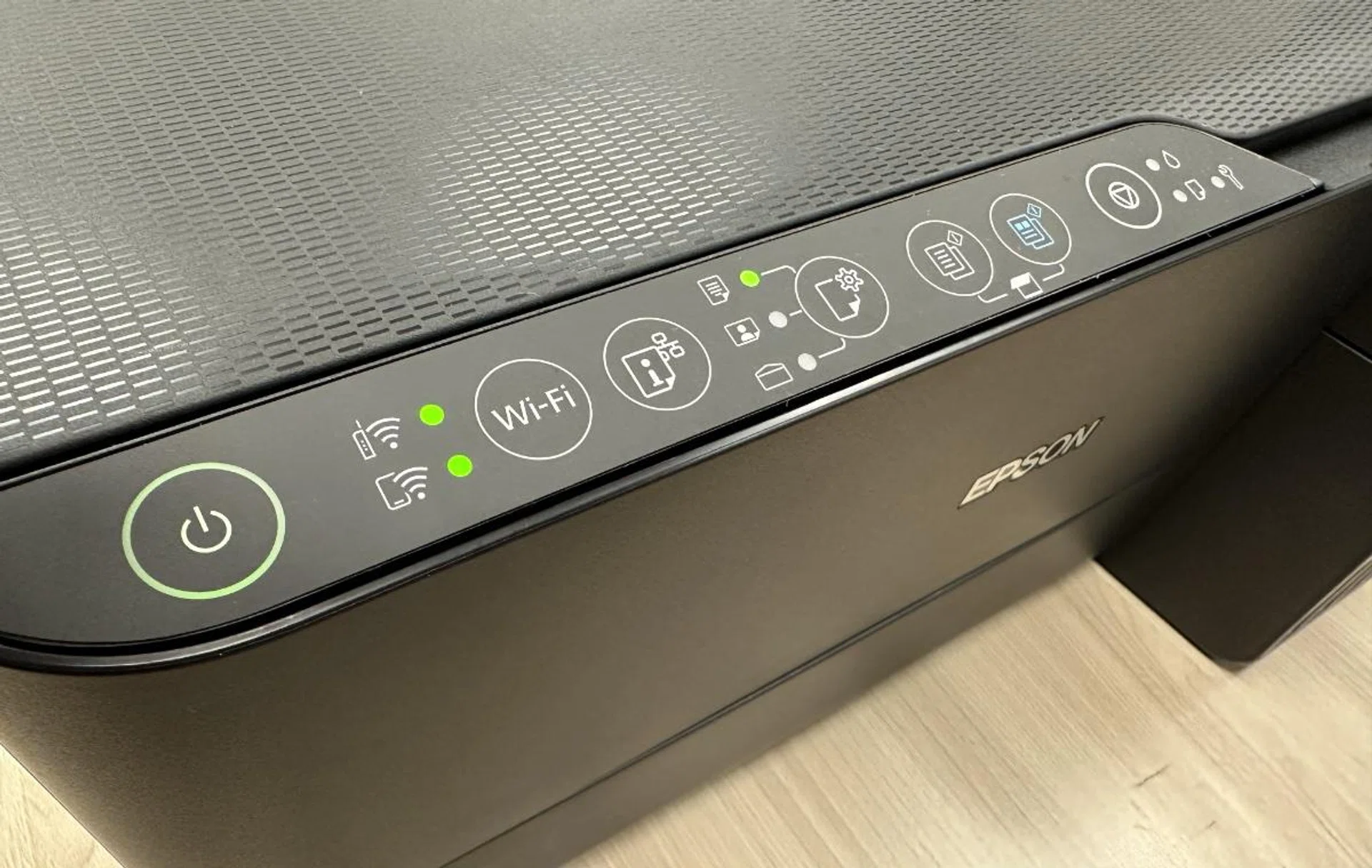 It isn't easy making sense of the status or the command buttons. (Editor's note: I can't understand the twin Wi-Fi status indicators' meaning without flipping the manual.)