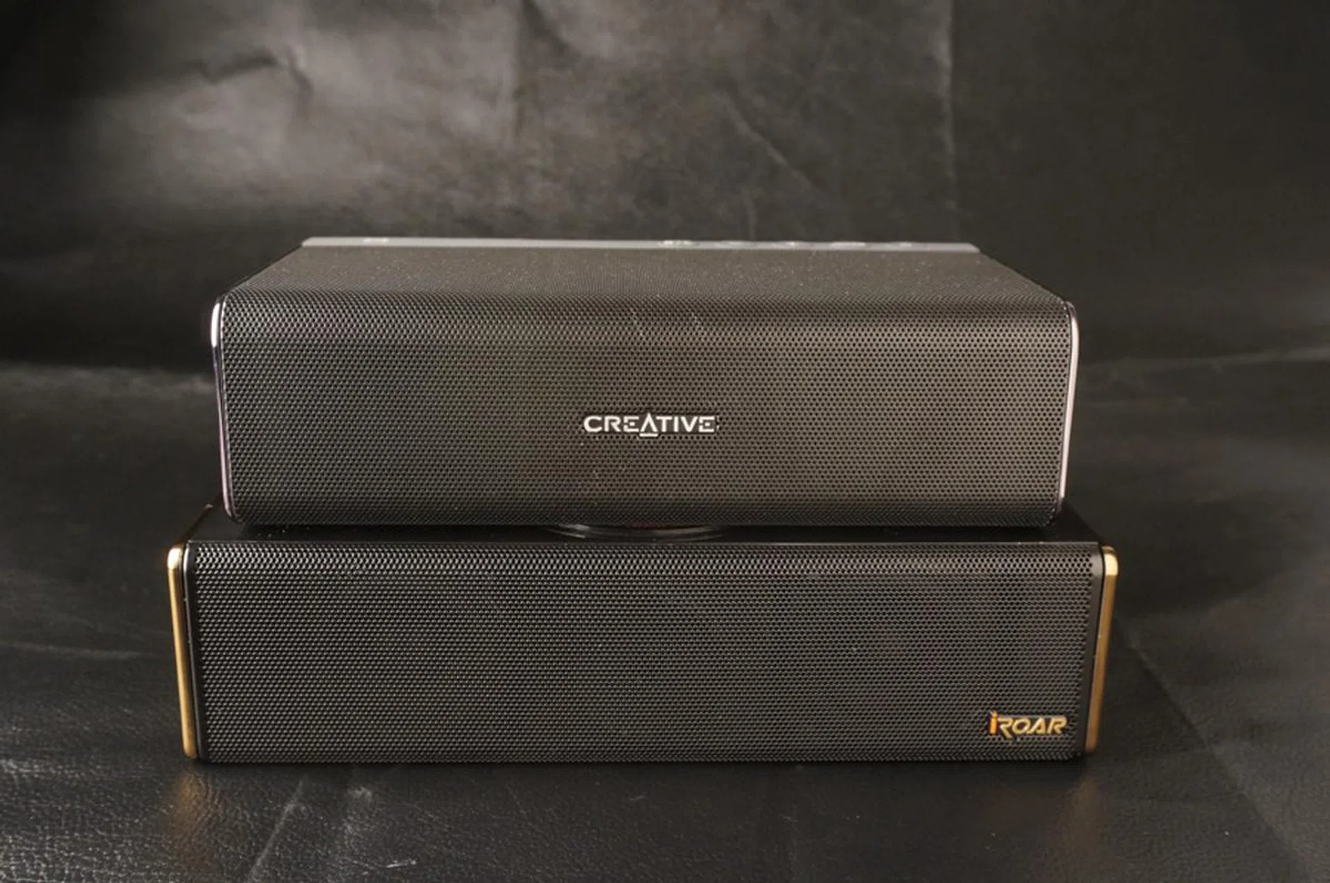 It's obvious the iRoar (below) is slightly wider and taller, but it's not heavier!