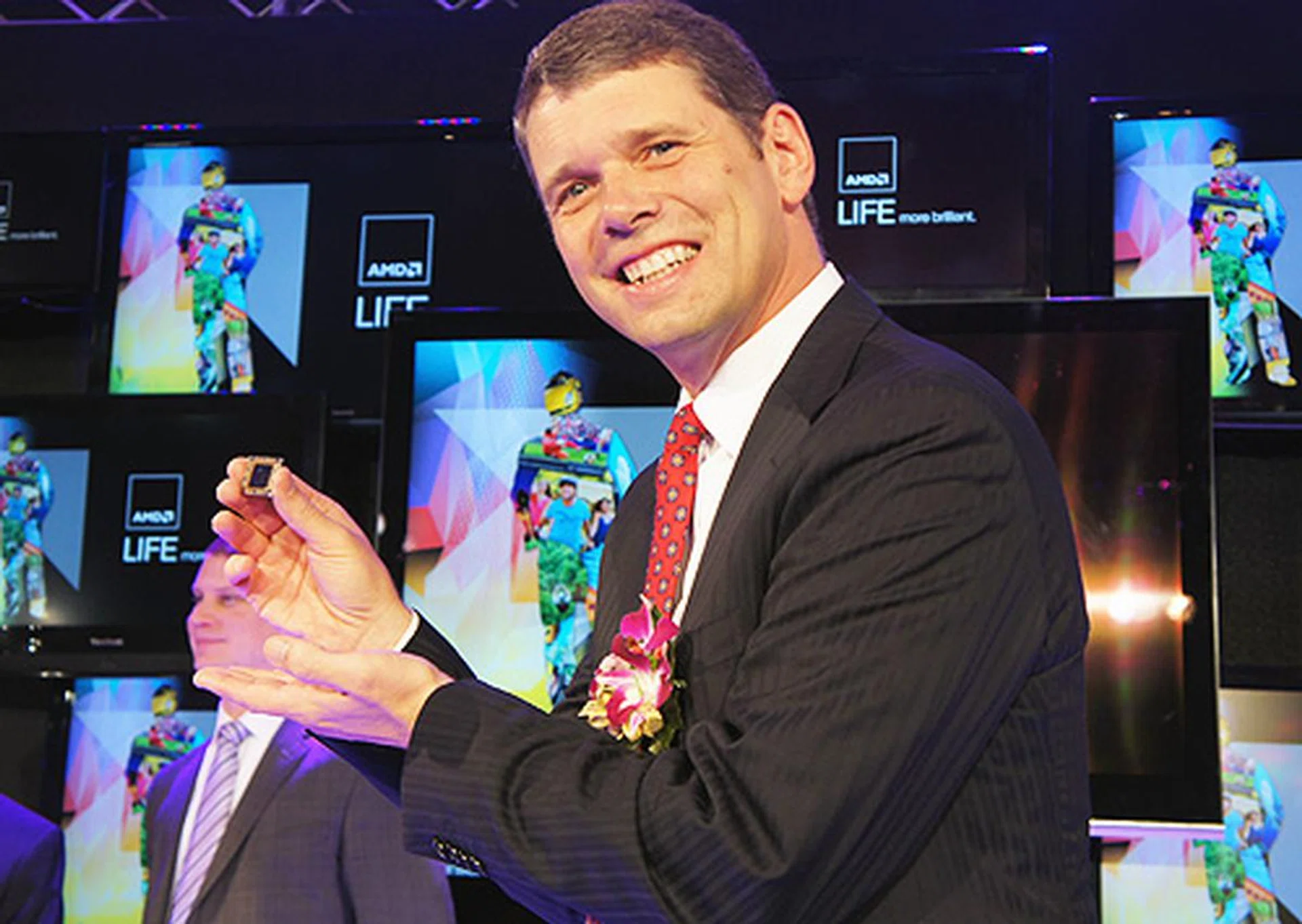 Rory Read, President and CEO of AMD, posing with the new Brazos 2.0 APU.