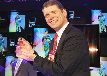 Rory Read, President and CEO of AMD, posing with the new Brazos 2.0 APU.