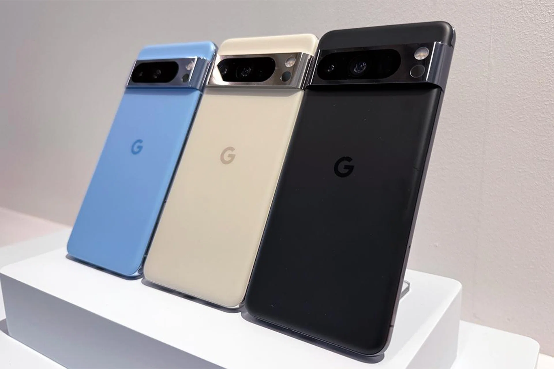 Google Pixel 8 Pro in Bay, Porcelain, and Obsidian (left to right).