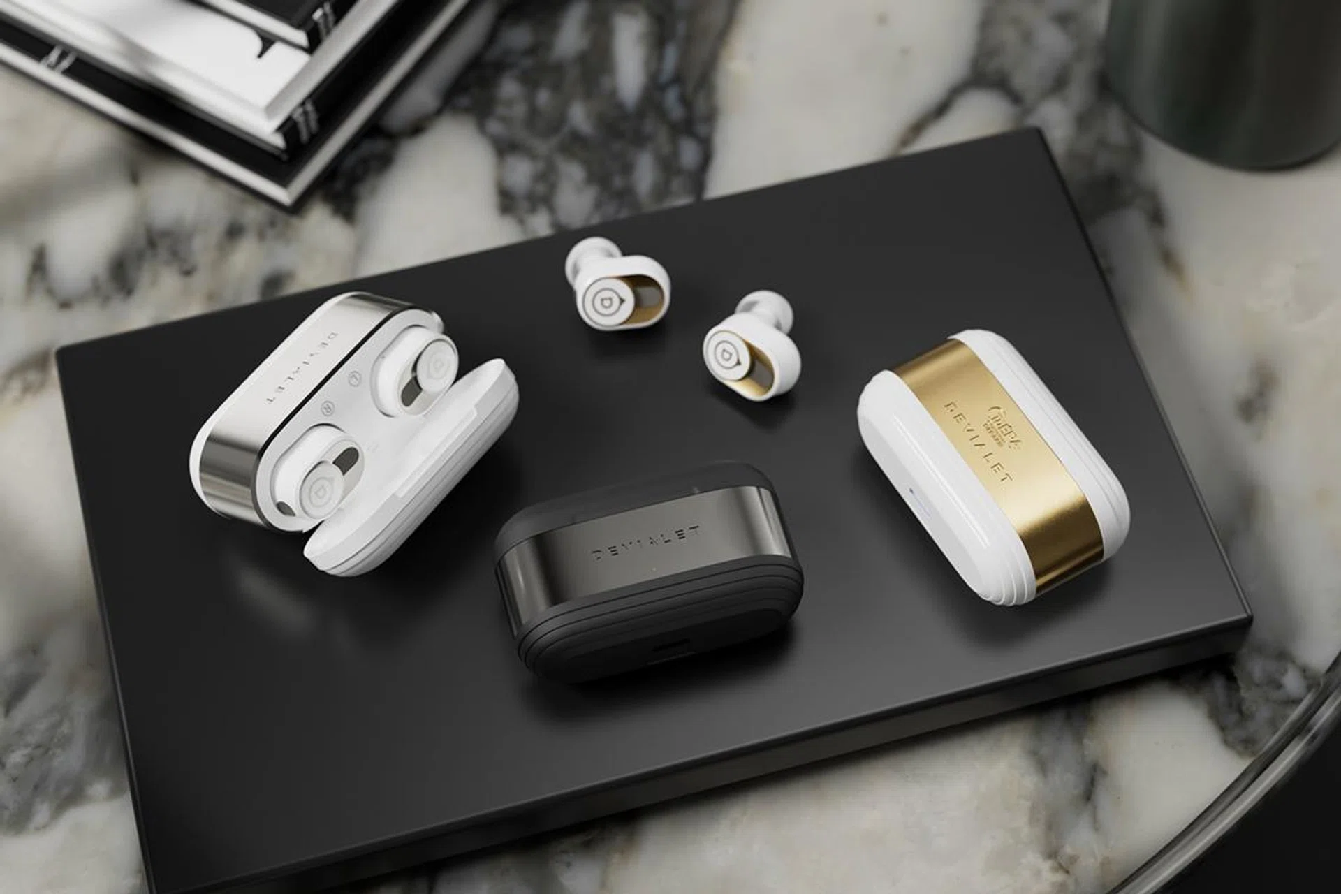 Devialet Gemini II in Iconic White (left), Matte Black (centre), and Opéra de Paris (right).