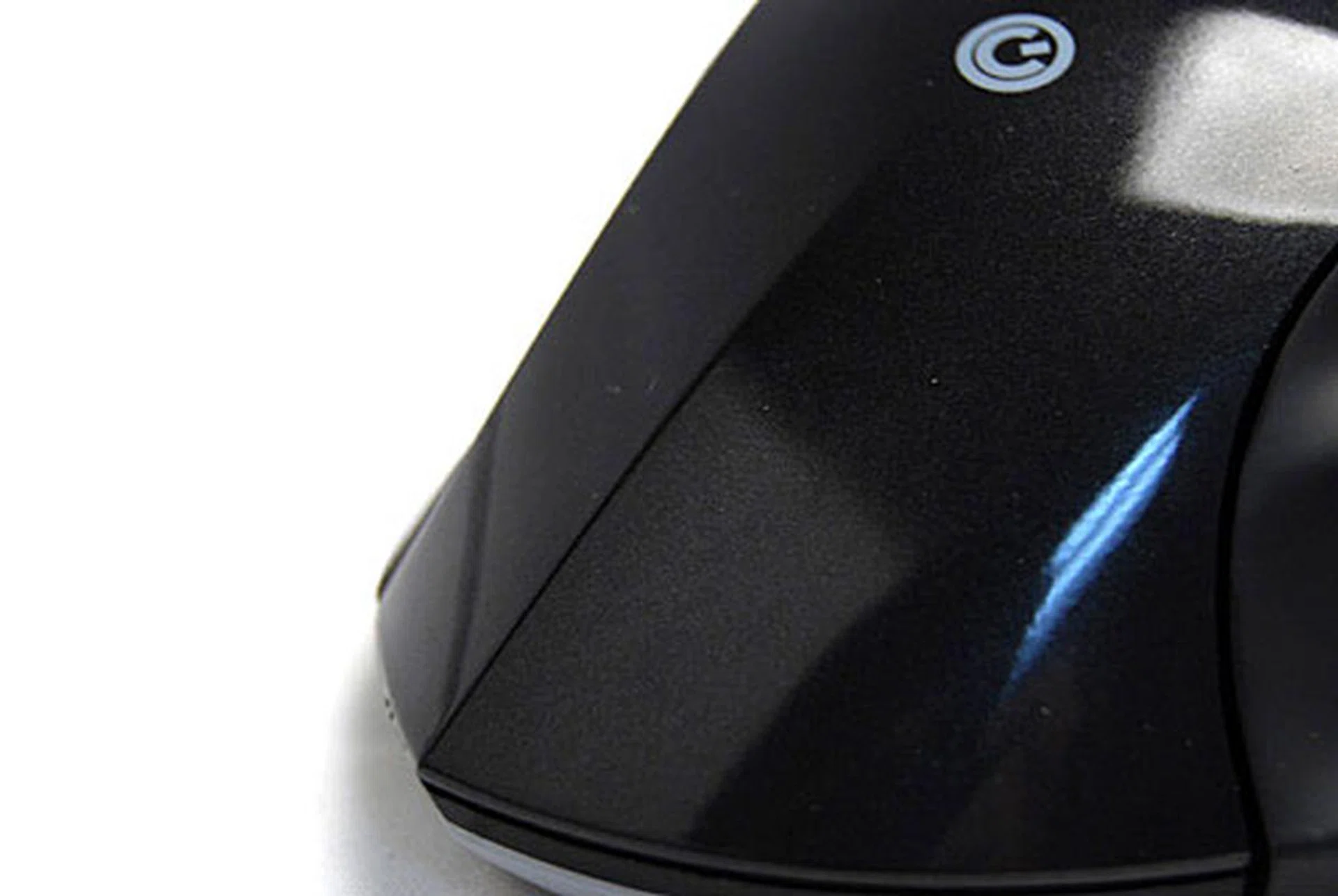 The ridge on the back of the mouse.