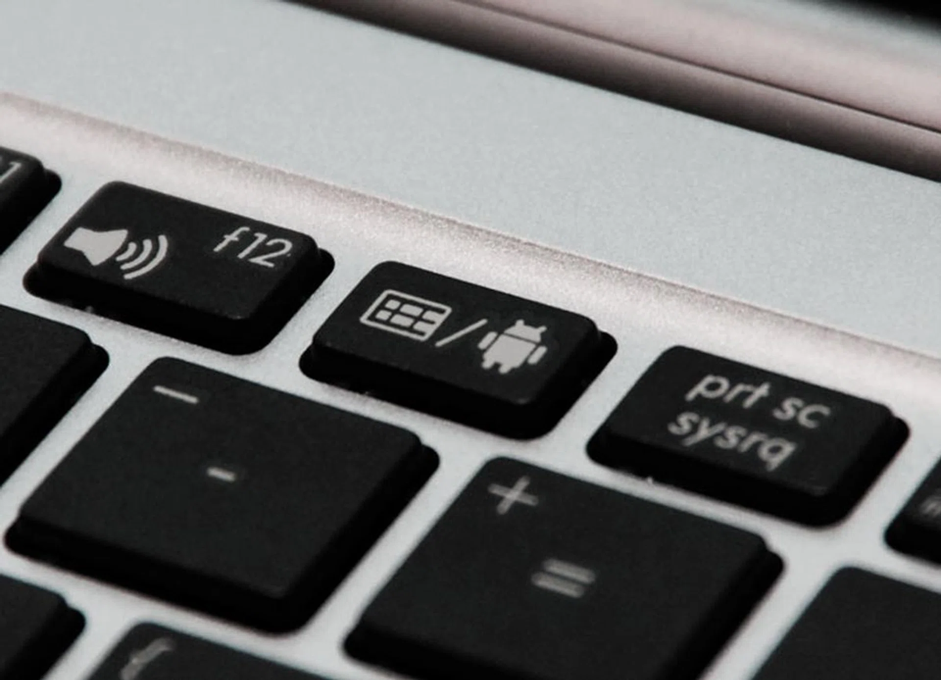 The OS switch buttons relies on software to switch between operating system, and only works when both the display and keyboard dock are combined and both operating systems are powered up. That is to say, you can't instant switch it into the Windows OS from the Android environment if the other system isn't yet power up.