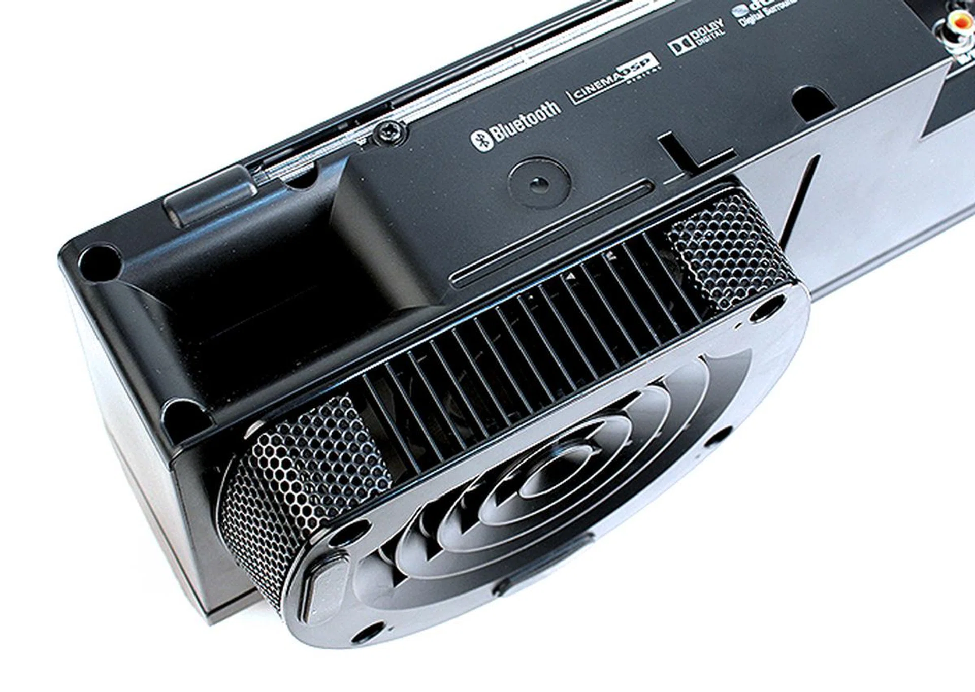 The subwoofer is integrated into the stands and the strip running above is the IR repeater.