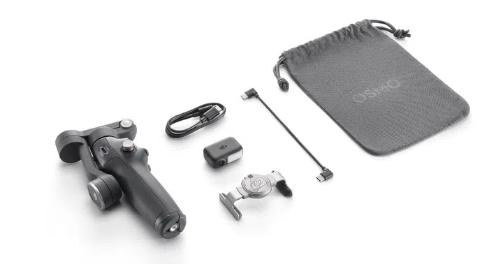 The Osmo Mobile 7 comes with travel pouch, cable and the Magnetic Phone Clamp. Photo: DJI