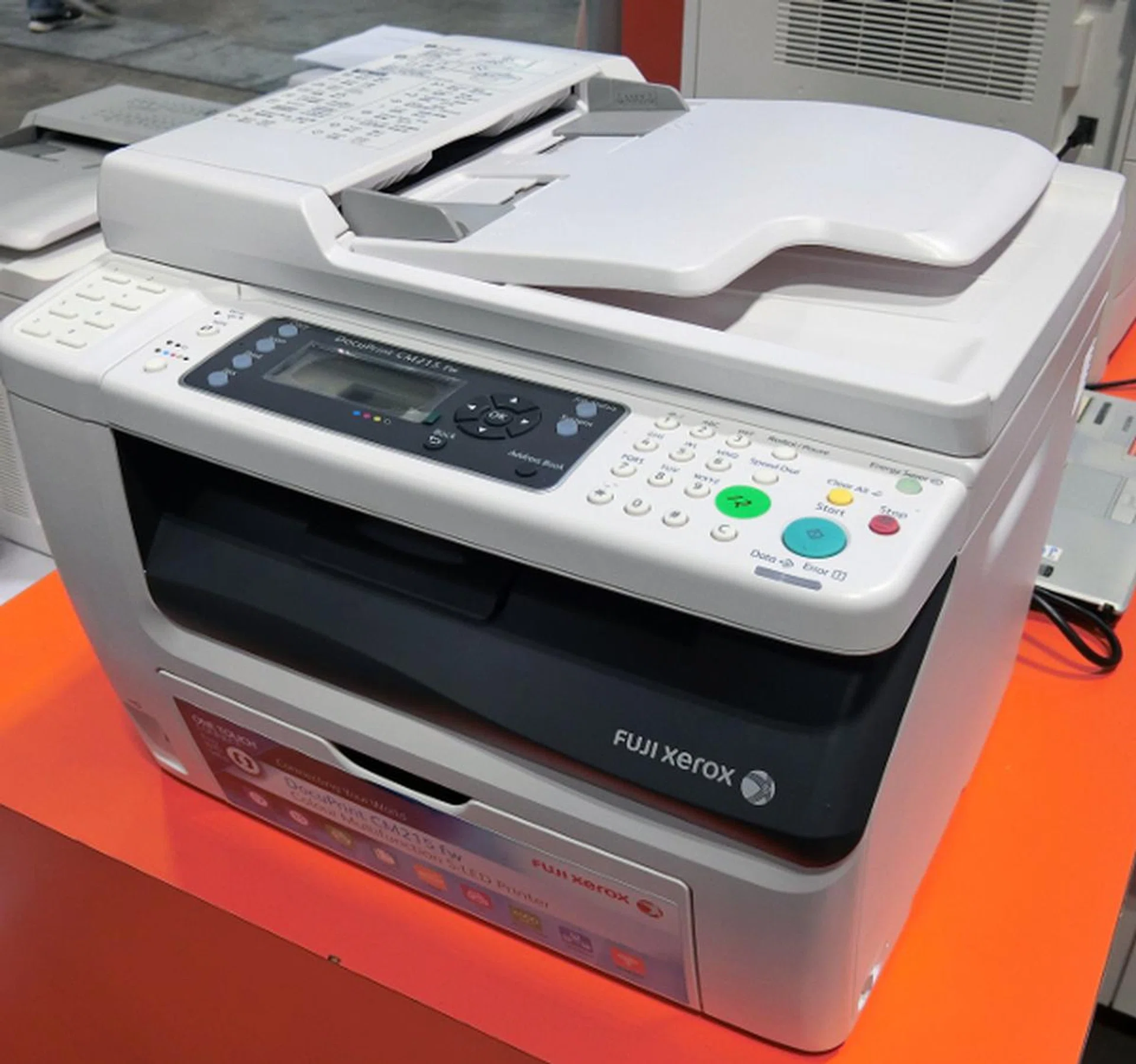 The DocuPrint CM215 fw is an A4 color S-LED printer that can also copy, scan and fax. It has print speeds of up to 12ppm for color documents and 15ppm for monochrome documents. It goes for $489 and comes with DocuWorks OCR software.