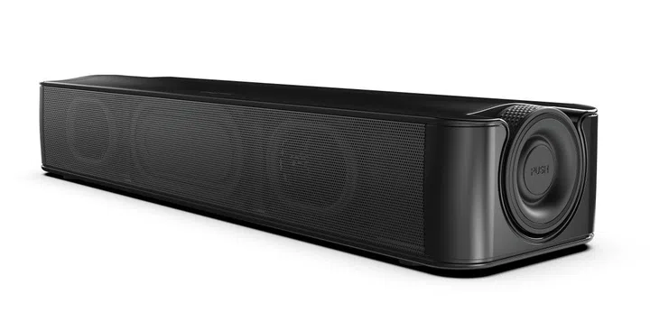 A close-up look at the new Creative Stage SE, its updated physical controls and a glimpse into the dual racetrack drivers and passive radiator behind the grille. (Image Source: Creative)