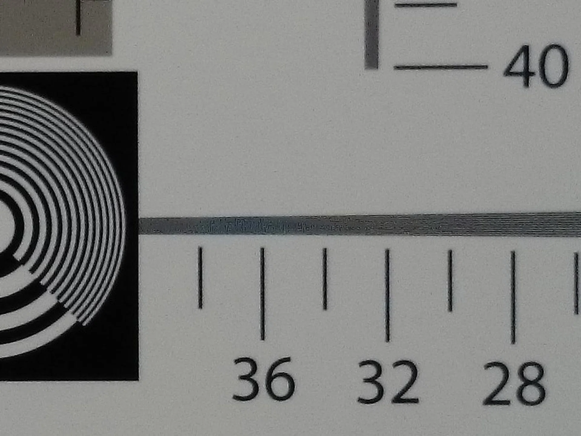 Sony Z1, 20MP, 100% crop. Odd artifacts still appear.