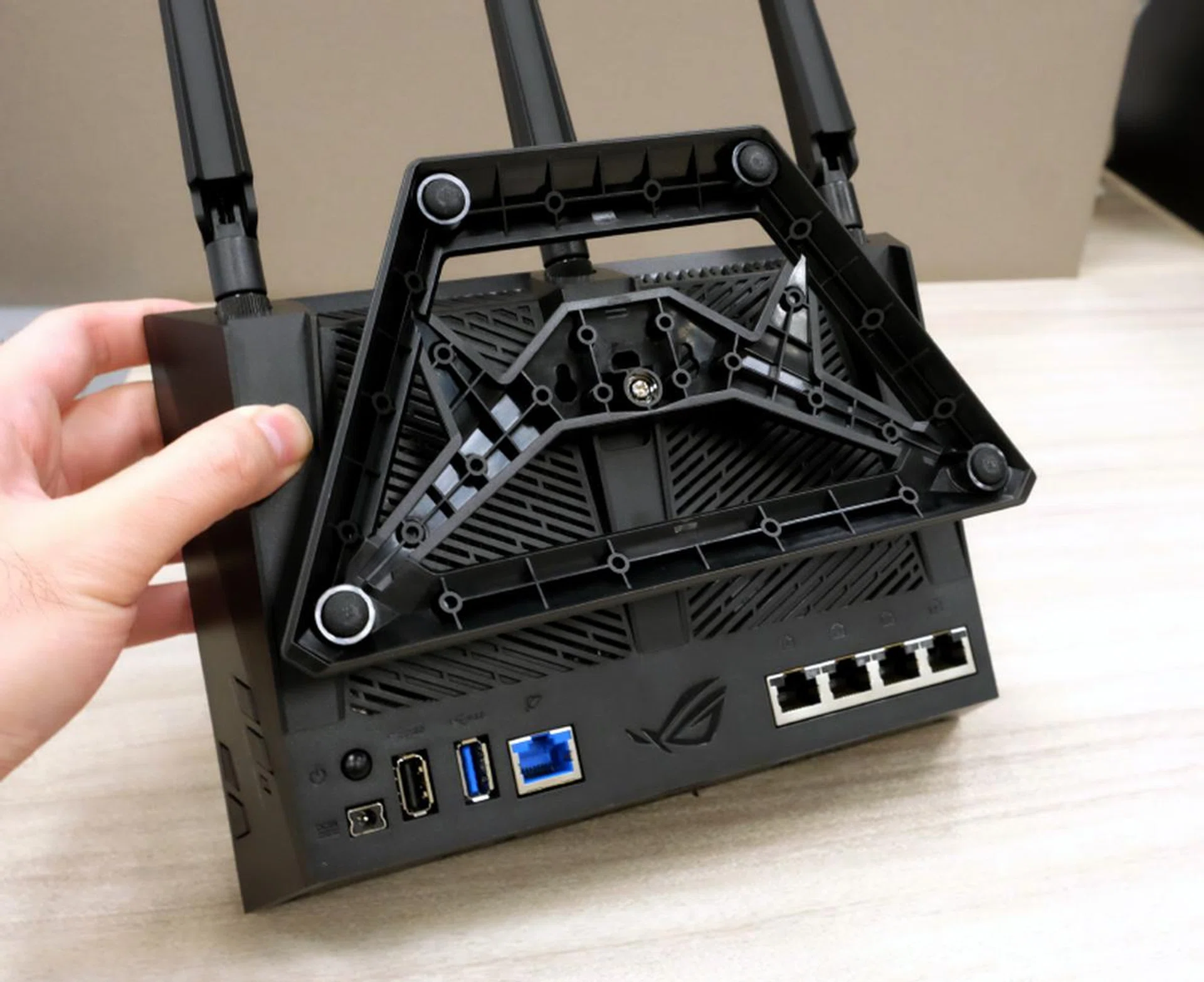 The stand doubles as a wall mounting bracket.