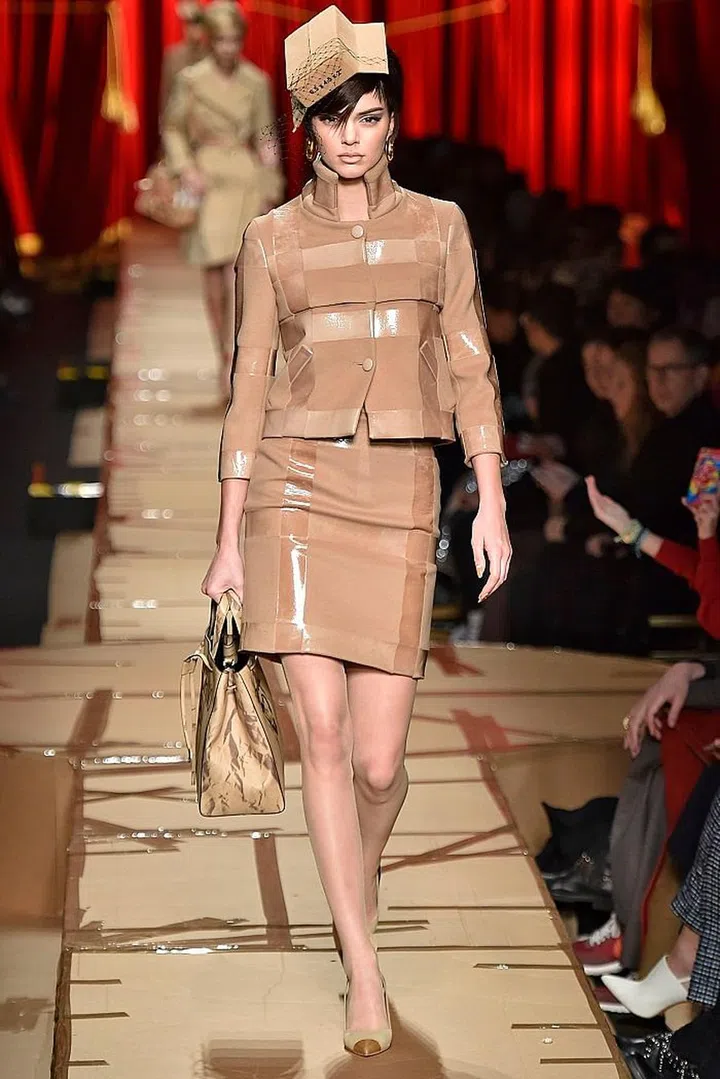 MILAN, ITALY - FEBRUARY 23: Kendall Jenner walks the runway at the Moschino Ready to Wear fashion show during Milan Fashion Week Fall/Winter 2017/18 on February 23, 2017 in Milan, Italy. (Photo by Victor VIRGILE/Gamma-Rapho via Getty Images)