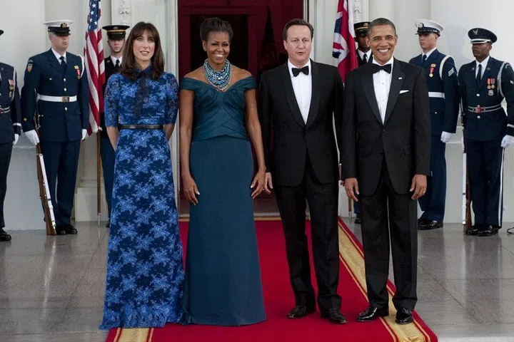 The First Lady and President pose with British Prime Minister David Cameron and his wife, Samantha Cameron.