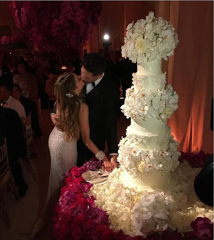 If you fell in love with Vergara's custom Zuhair Murad couture gown, wait until you see her cake. Designed by Sylvia Weinstock, the five-tiered cake featured a quilted design, flowers over each tier, and was topped with a giant floral arrangement. Photo: Instagram
