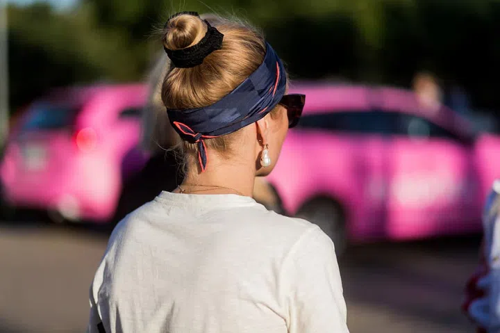 Accessorise with simple scarves and statement earrings. Photo: Getty 