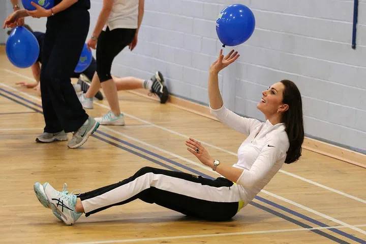 The Duchess participates in a kid's tennis workshop at Craigmount High School in Edinburgh, Scotland.
Photo: Getty