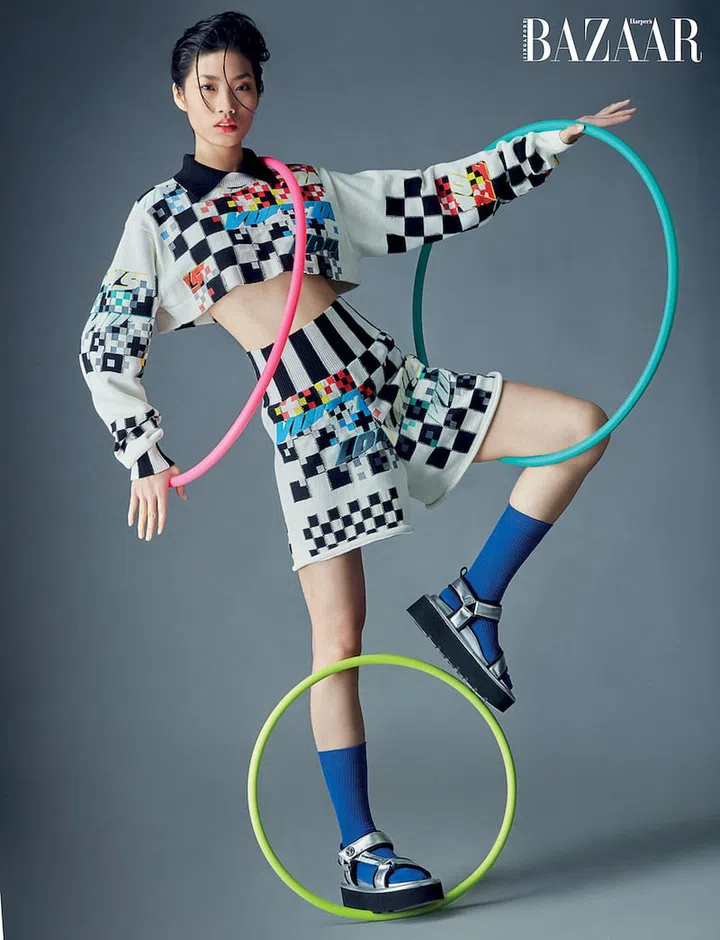 Cotton‐blend bandana halter top; silk‐blend Bermuda shorts; viscose‐blend Loop LV Match bag, all from Louis Vuitton. (Photo: Gan)