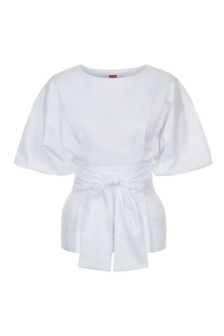 The statement shirt made the big-time last season and its reign will continue though autumn/winter 2017. As ideal for the office as it is for evening drinks, no wardrobe is complete without one. Consider puff sleeves, belted waists, extra long sleeves and detailed cuffs.
<b>Cocoon sleeve shirt, £65, Kitri</b>