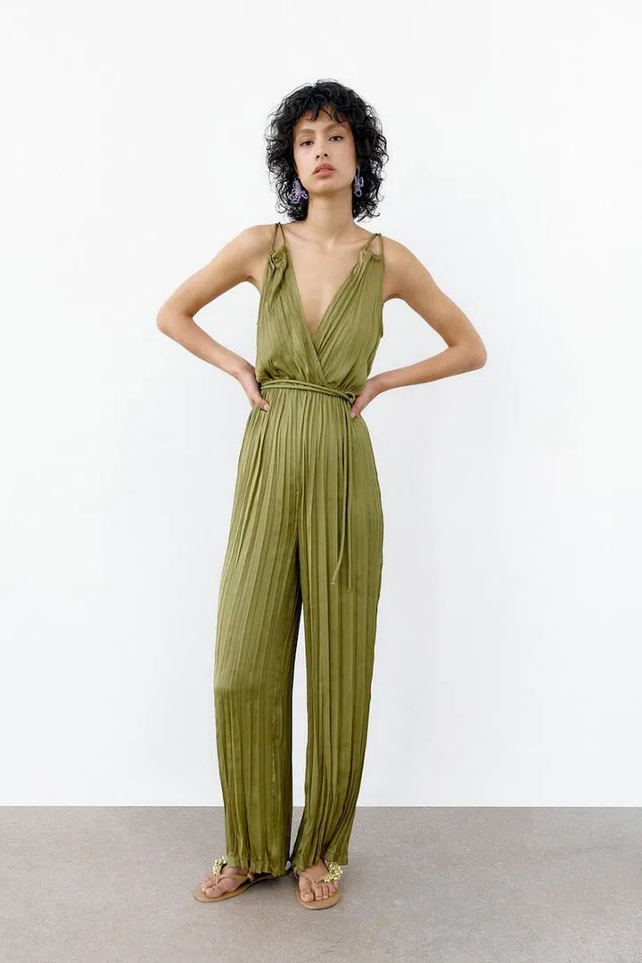 Long Pleated Jumpsuit, $89.90, Zara
