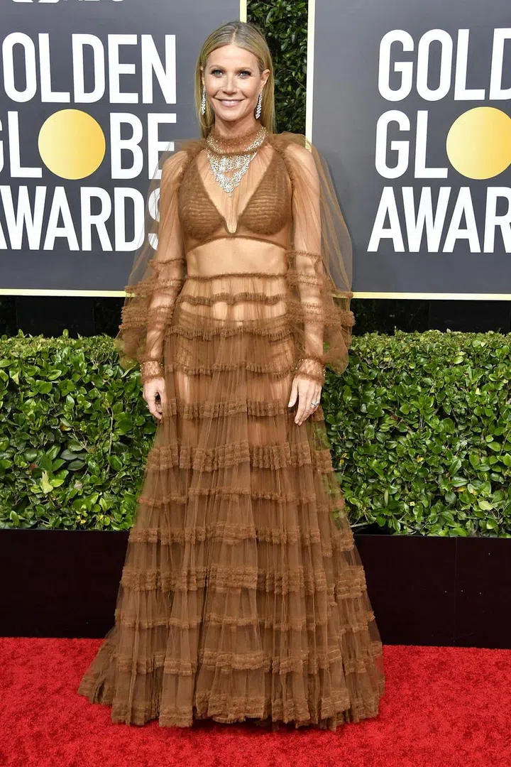What: Fendi

Why: In a sheer, caramel-colored silky tulle gown done up in delicate ruches and offset in a truly blingy Bulgari necklace—100 carats of diamonds to be exact—Paltrow shone like the star she is. Photo: Getty