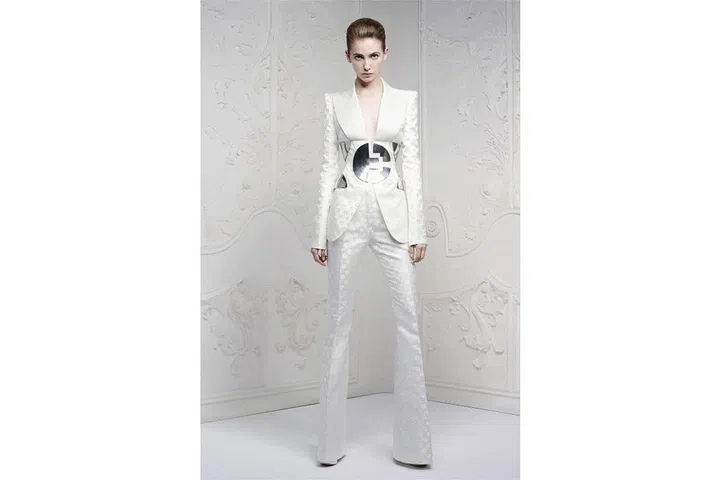 Sarah Burton's tableau mimicked the louche Seventies back cover of Bowie's "Hunky Dory" album almost to the t. And the clothes hit a space age note of his other eras, too. ; Photo: Alexander McQueen