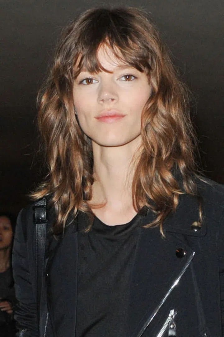 The model nails the perfectly disheveled bed head look every time.