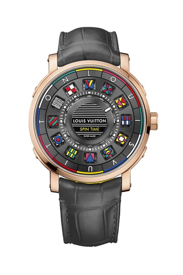 As the hours pass on the Louis Vuitton Escale Spin Time, colorful cubes printed with nautical flags turn to reveal the hour as a single white hand indicates the minutes. Every hour the watch changes its appearance, cubes turning to reveal new colors and patterns. The lugs of the watch are based on details taken from the classic LV steamer trunks, a nod to the brand's history of luxury travel.
Louis Vuitton, Escale Spin Time, Price Upon Request, Available at select Louis Vuitton stores or louisvuitton.com