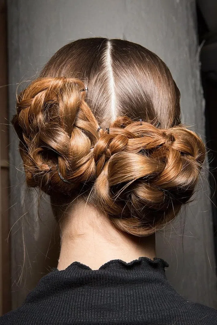 Double braided buns had a Princess Leia quality backstage at JS Lee.