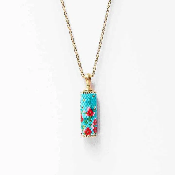 Modern Peranakan Capsule Pendant Necklace in Blue, $259, EDEN + ELIE at KrisShop